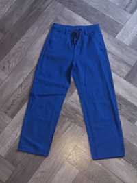 Spodnie jeansowe niebieskie 38 m