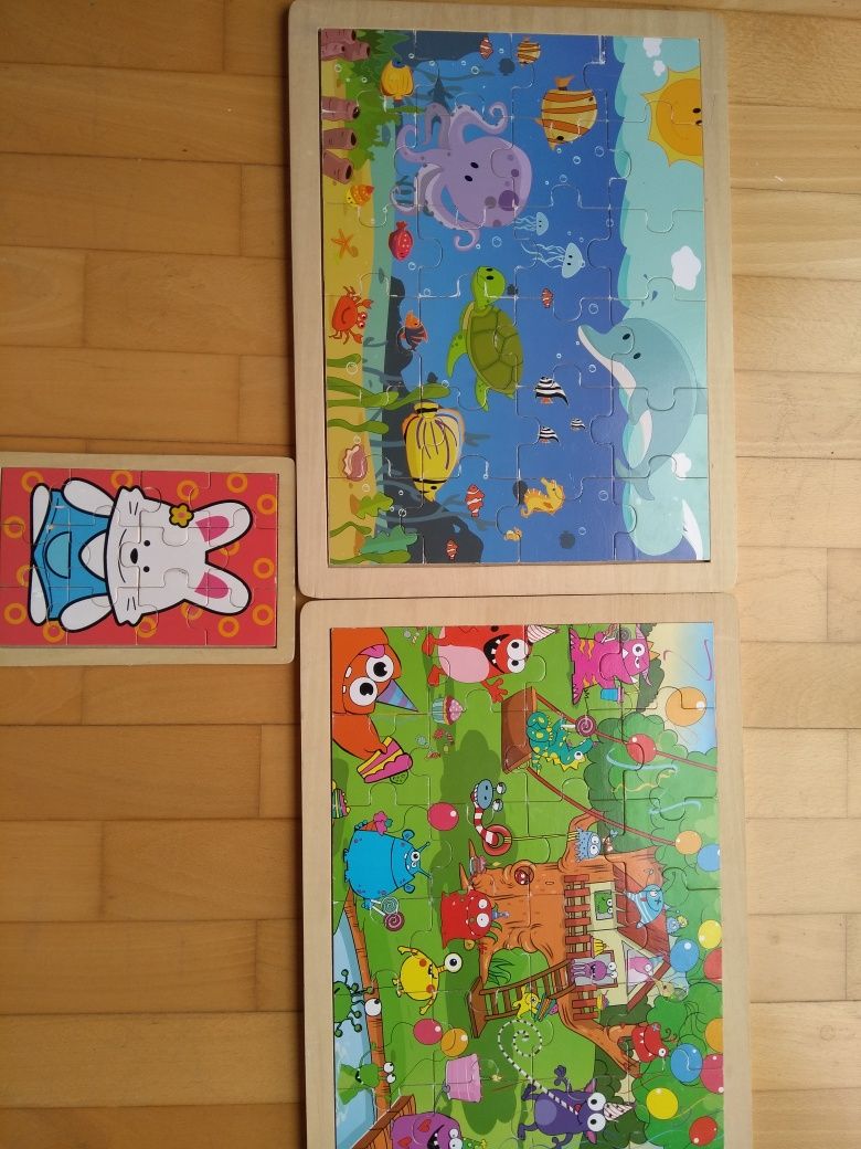 Puzzles em madeira e em cartão