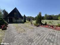 Piękna działka 6500 m2 z całorocznym domem letniskowym.