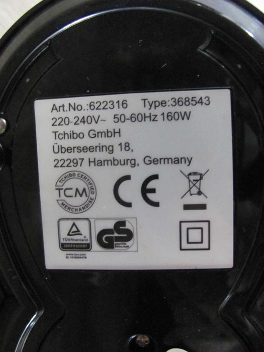 Elektryczny młynek Tchibo do kawy z wagą