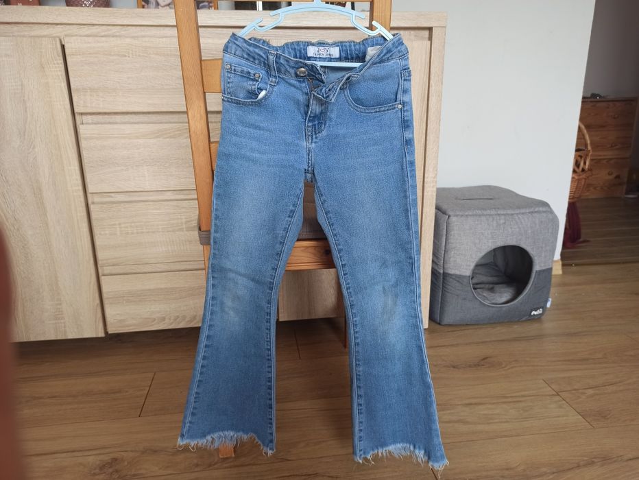 Jeansy dzwony 128