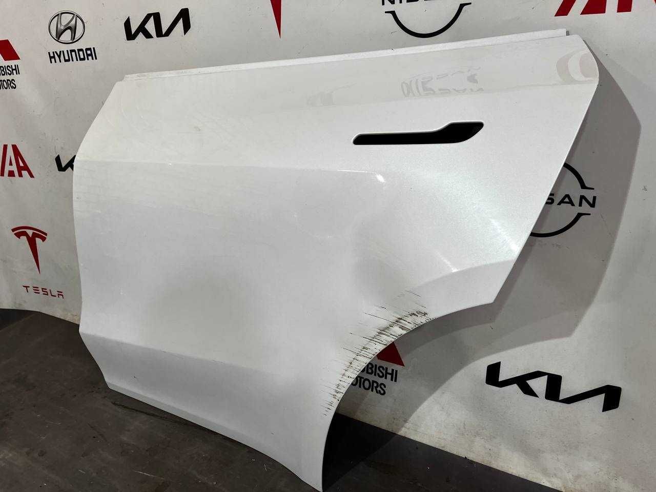 Двері задні ліві Tesla Model Y 2020-2024