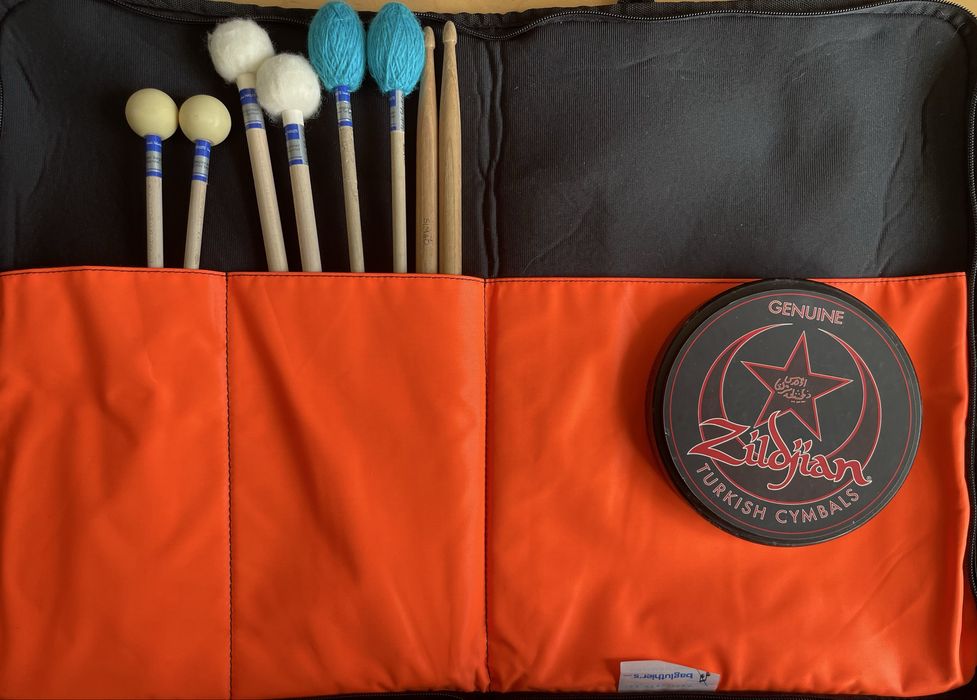 Conjunto de baquetas com pad de treino