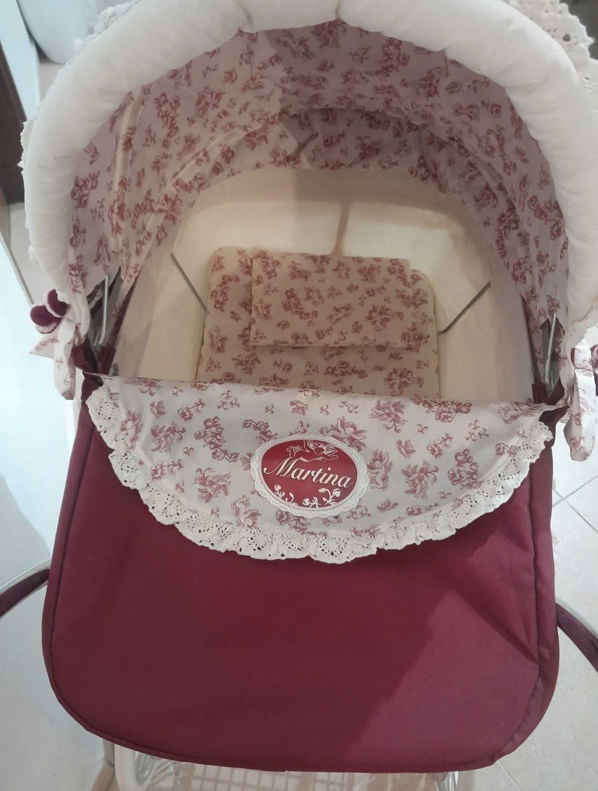 Carrinho de bebés de brincar
