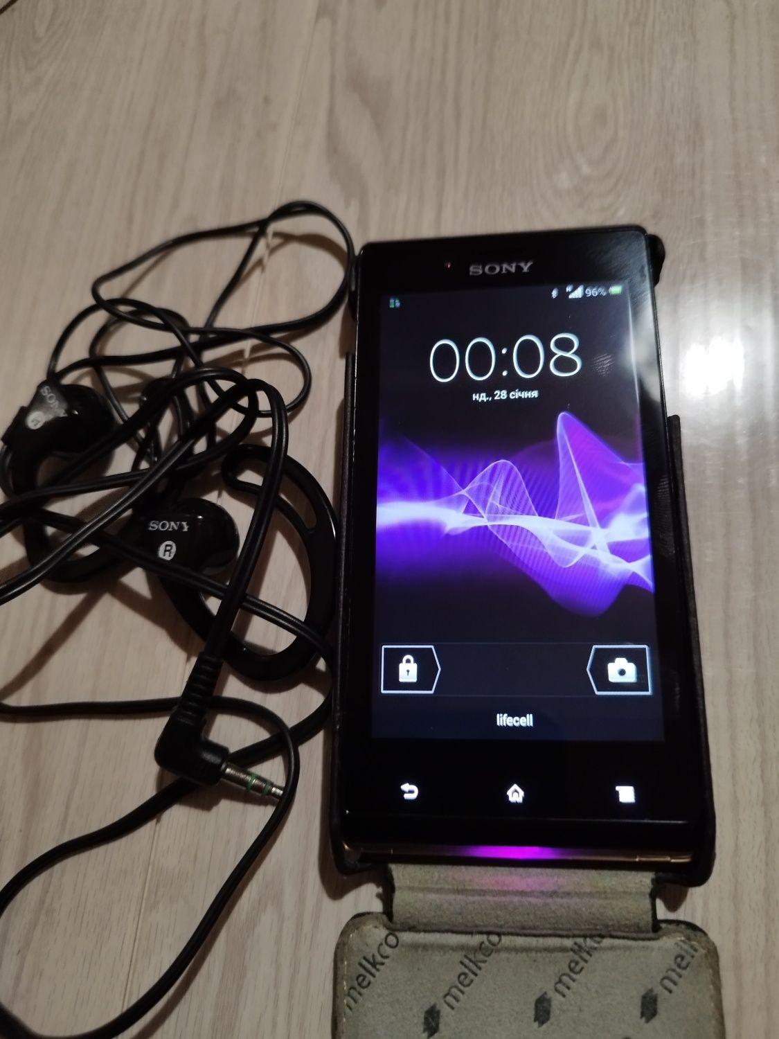 Телефон Sony  st 26i