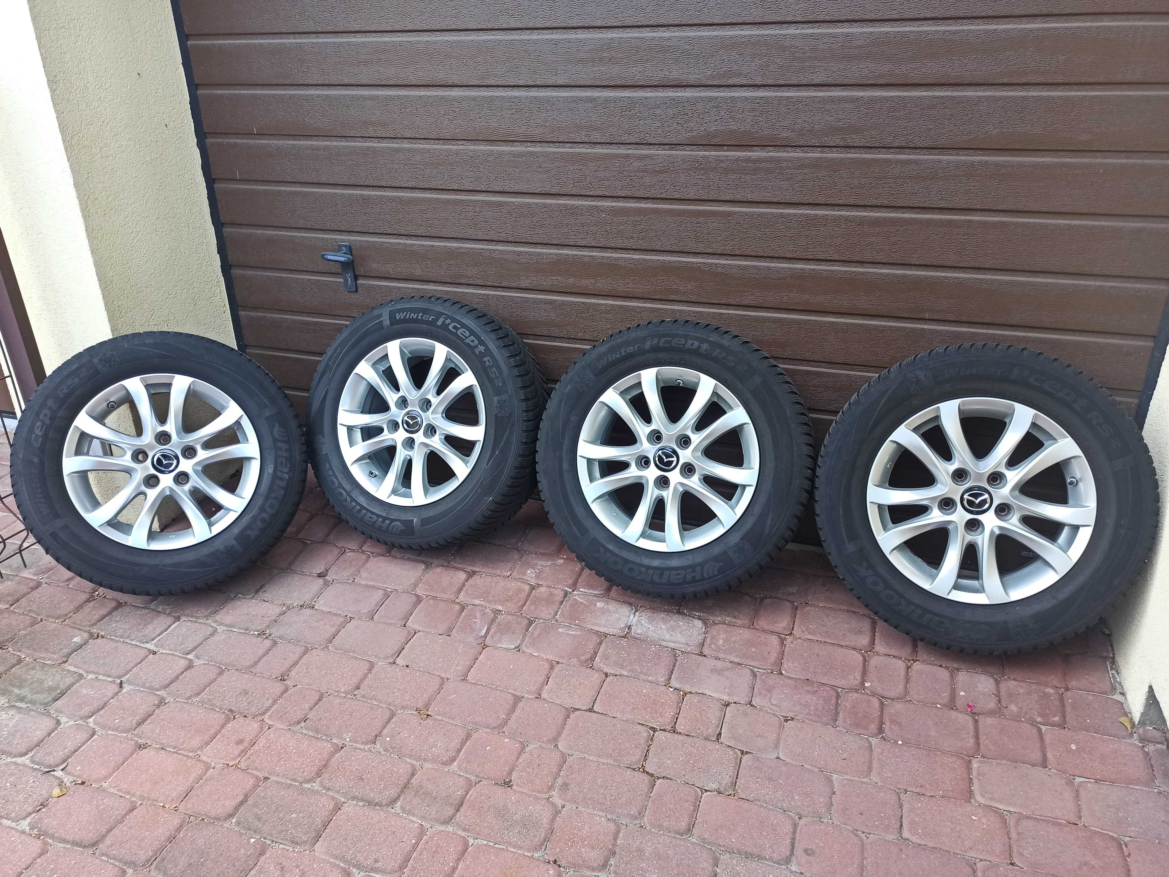 Koła oryginalne Mazda - alufelgi 16 z oponami zimowymi Hankook