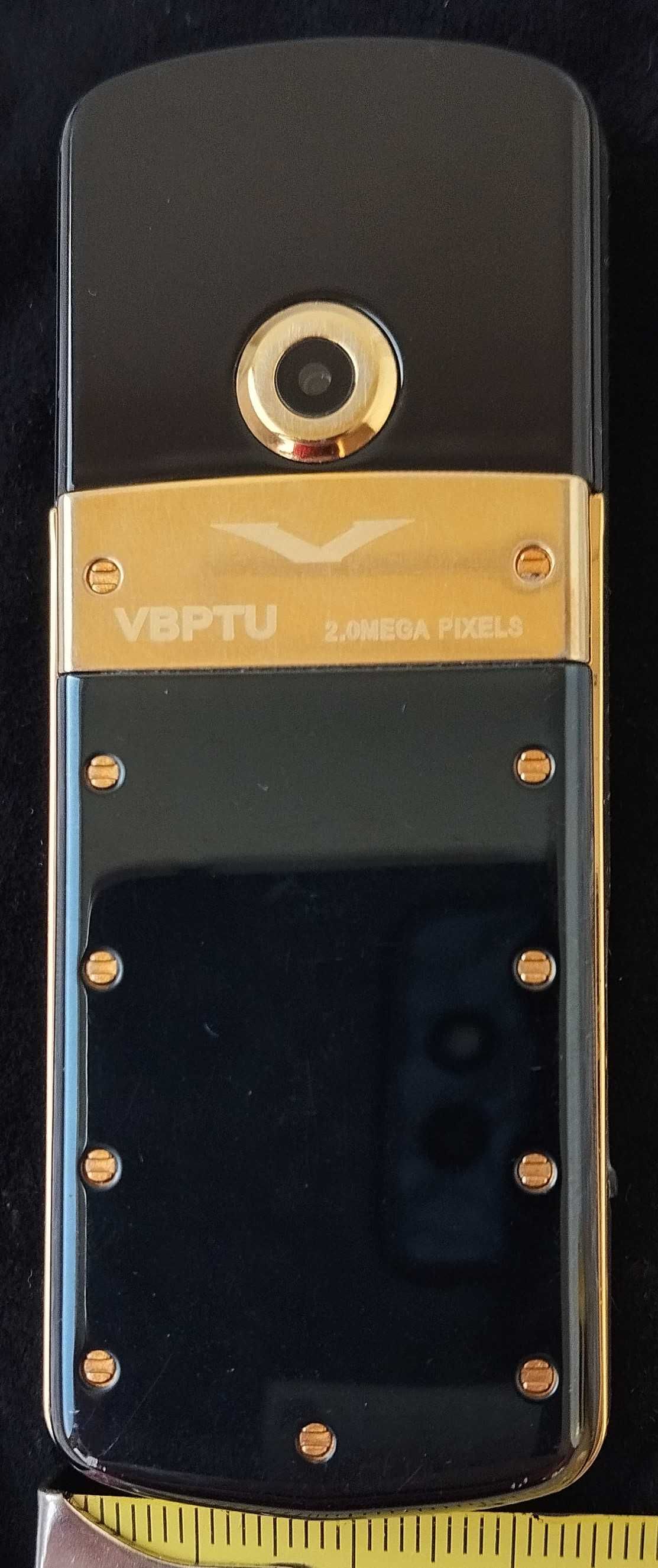 Мобільний телефон VBPTU 2.0 mega pixels у неробочому стані.