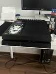 PlayStation 4 + Jogo The Last of Us