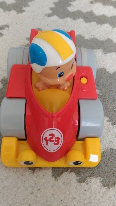 Samochodzik szczeniaczka łuczniaczka Fisher Price