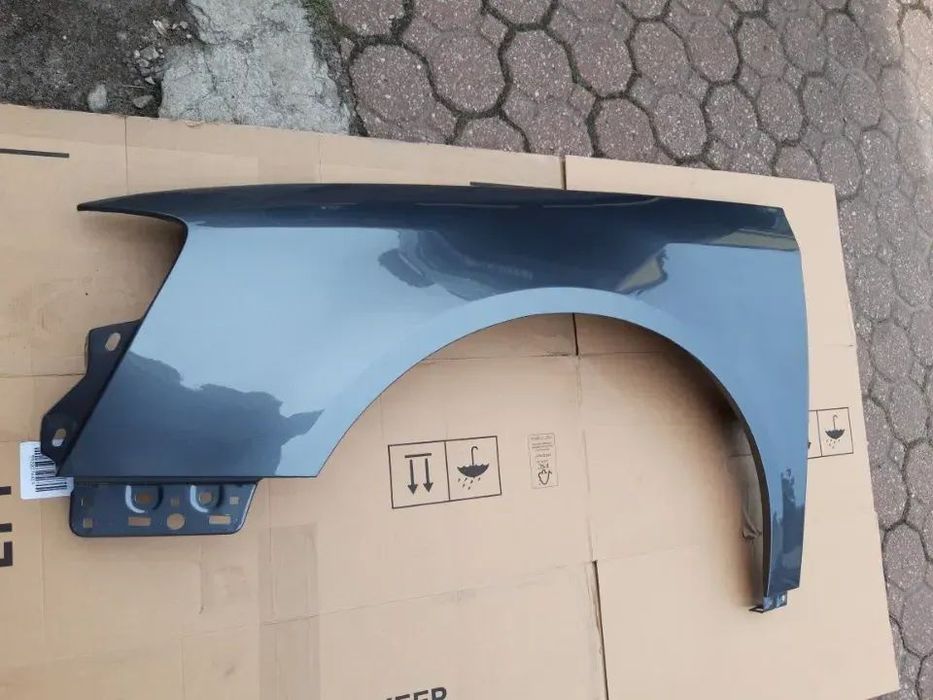 Błotnik przód przedni lewy VW PASSAT B6 LA7T United Grey Metalic szary metalik sedan kombi 2005-2010