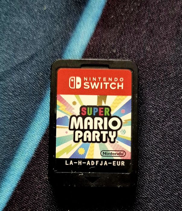 Nintendo Switch + 2 gry