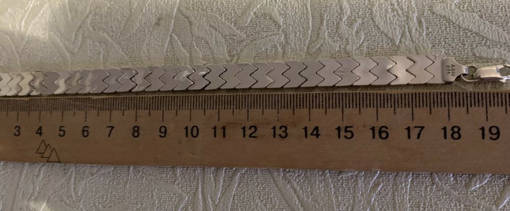 Серебряный браслет .