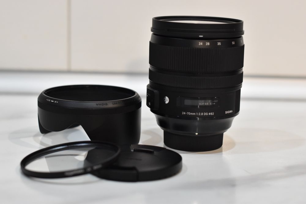 Sigma for Nikon 24-70 2.8 + Фільтр UV стан нового одна помарка