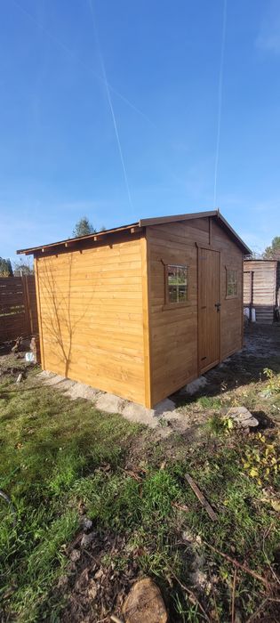 Domki narzędziowe na narzędzia drewutnie place zabaw huśtawki