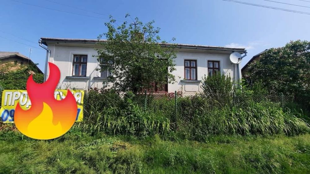 Продаж будинку поруч із містом