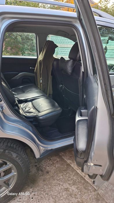 Автомобиль митсубиси аутлендор