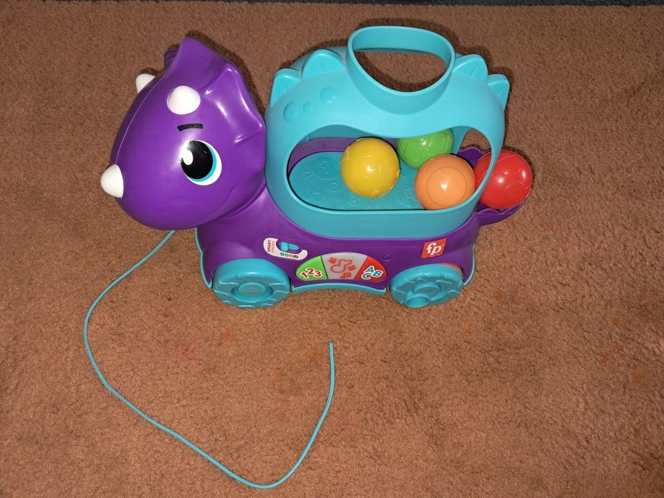 Веселий трицератопс Fisher price
