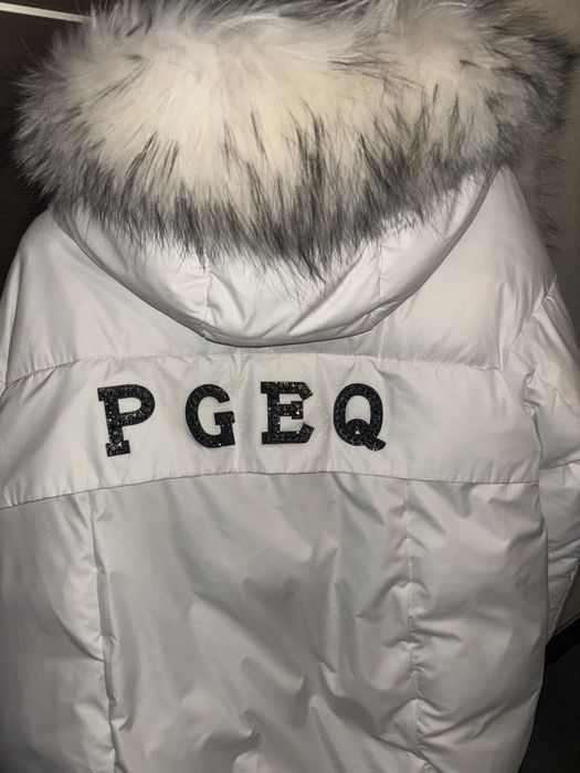 Жіночий пуховик розмір L