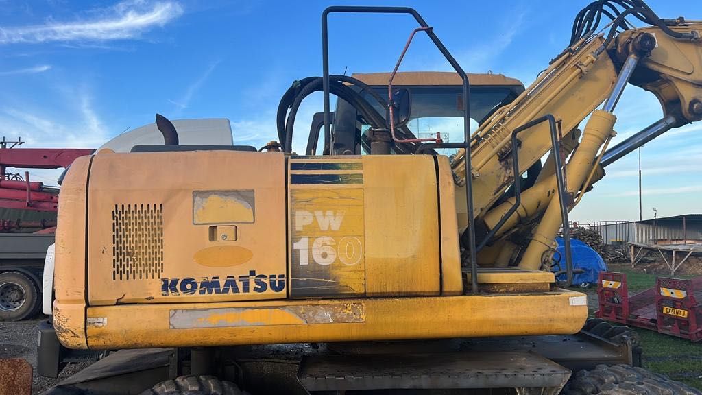 Ескаватор Komatsu pw160