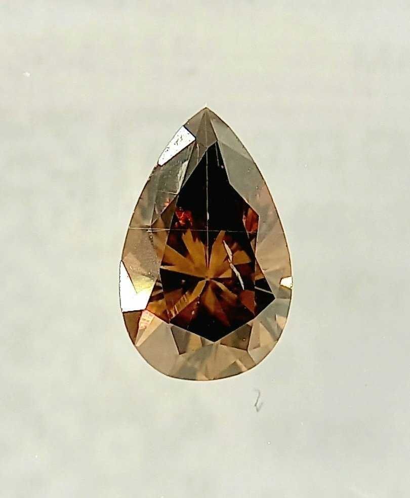 Diamante 0.63 ct SI1 (Pera, castanho amarelado escuro fantasia)