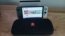 Nintendo switch OLED z grą  sport party.