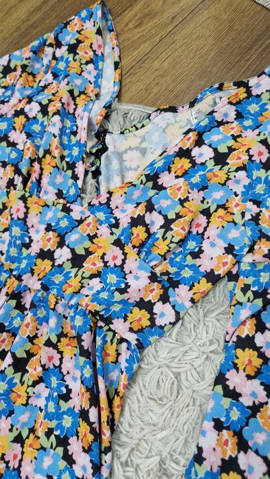 Boski kombinezon w kwiaty, szerokie nogawki - Asos 40/42