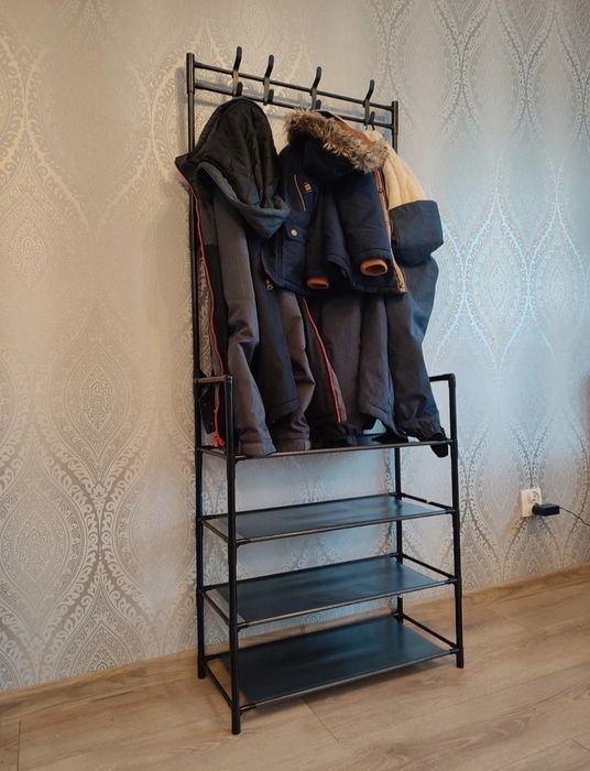 Nowy czarny wieszak na ubrania z regałem na buty 4 poziomy