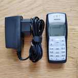 Nokia 1101 и зарядное