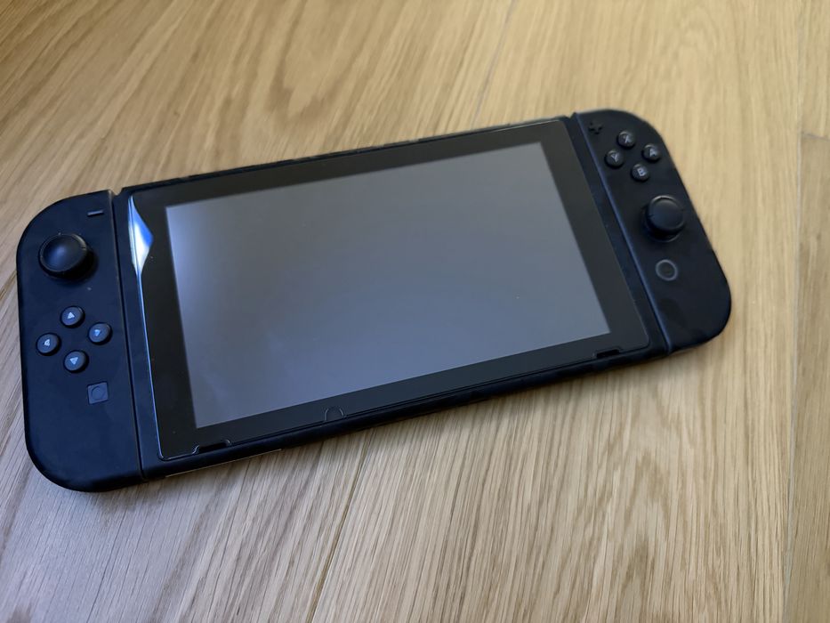 Nintendo Switch V1 (Desbloqueada) + SD 512GB + acessórios originais