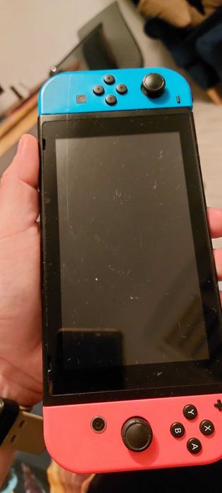 Nintendo Switch, gwarancja, dodatkowy pad i gra.