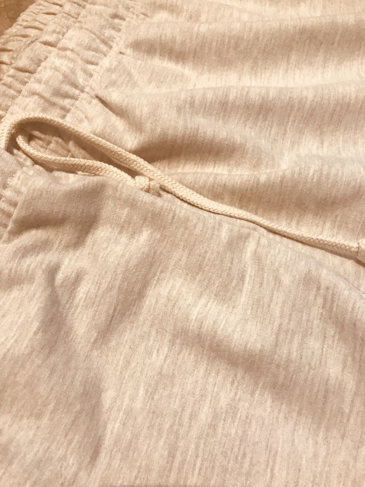 Spodnie dresowe duze bawełna krem bydyniowe unisex Uni 52