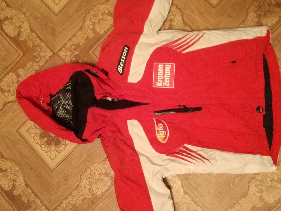 Детские зимние комбинезоны.