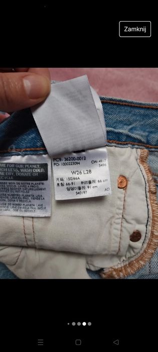 Jasnoniebieskie jeansy Levi's 501 , dziury,  W 26 L 28
