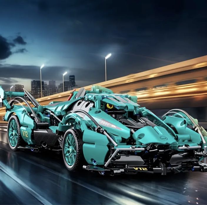 Контсруктор 1300 деталей спортивна машинка 36*17см lego technic бірюза