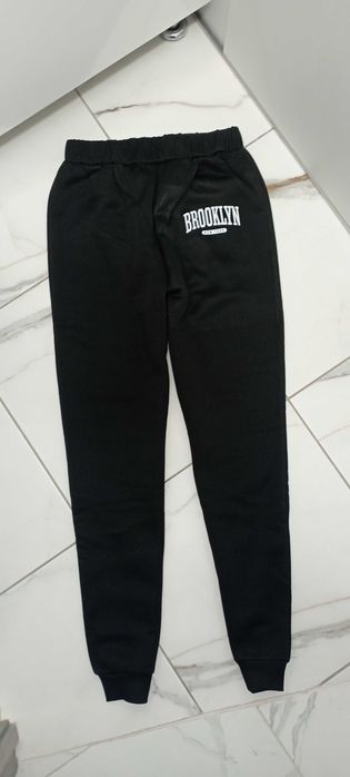 Нові теплі спортивні штани на зріст 160 см