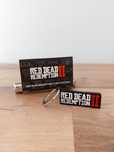 Oficjalny brelok Red Dead Redemption 2 merch Rockstar Games keychain