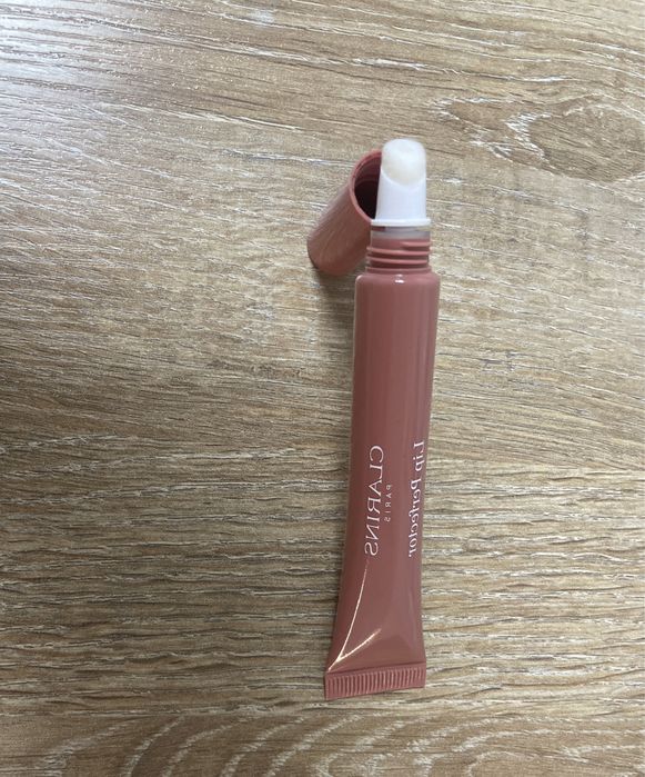 Блеск для губ Clarins Natural Lip Perfector 06 оригинал новый
