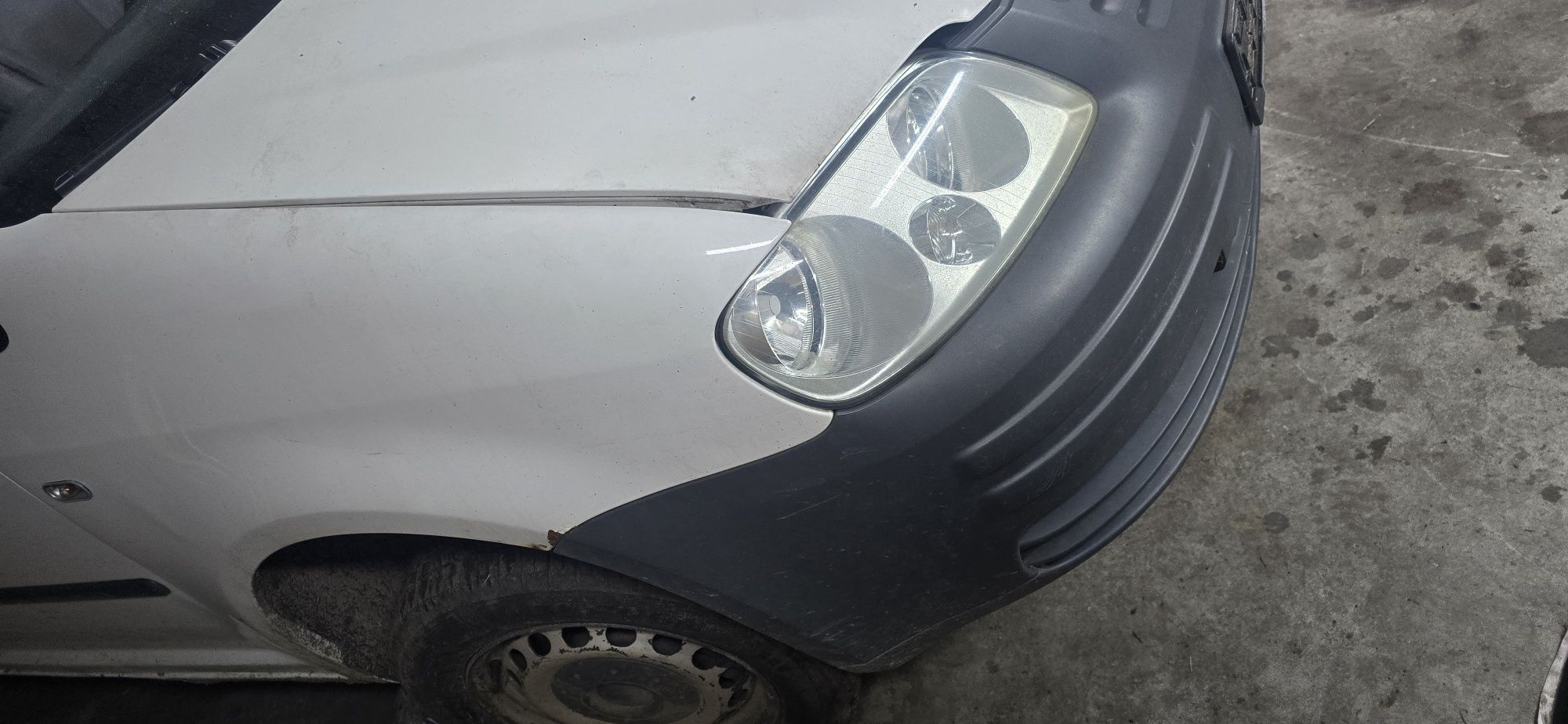 Zderzak blotnik maska lampy caddy 04-10 2.0 sdi BDJ