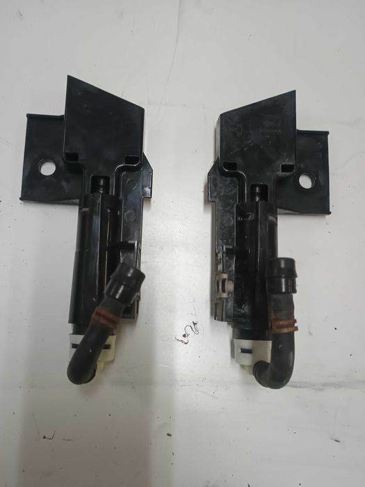 Lewy spryskiwacz lampy Subaru Outback IV 2013r. Oryginał