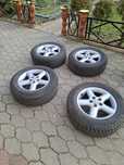 Felgi aluminiowe Nissan razem z oponami zimowymi 215/65 R16