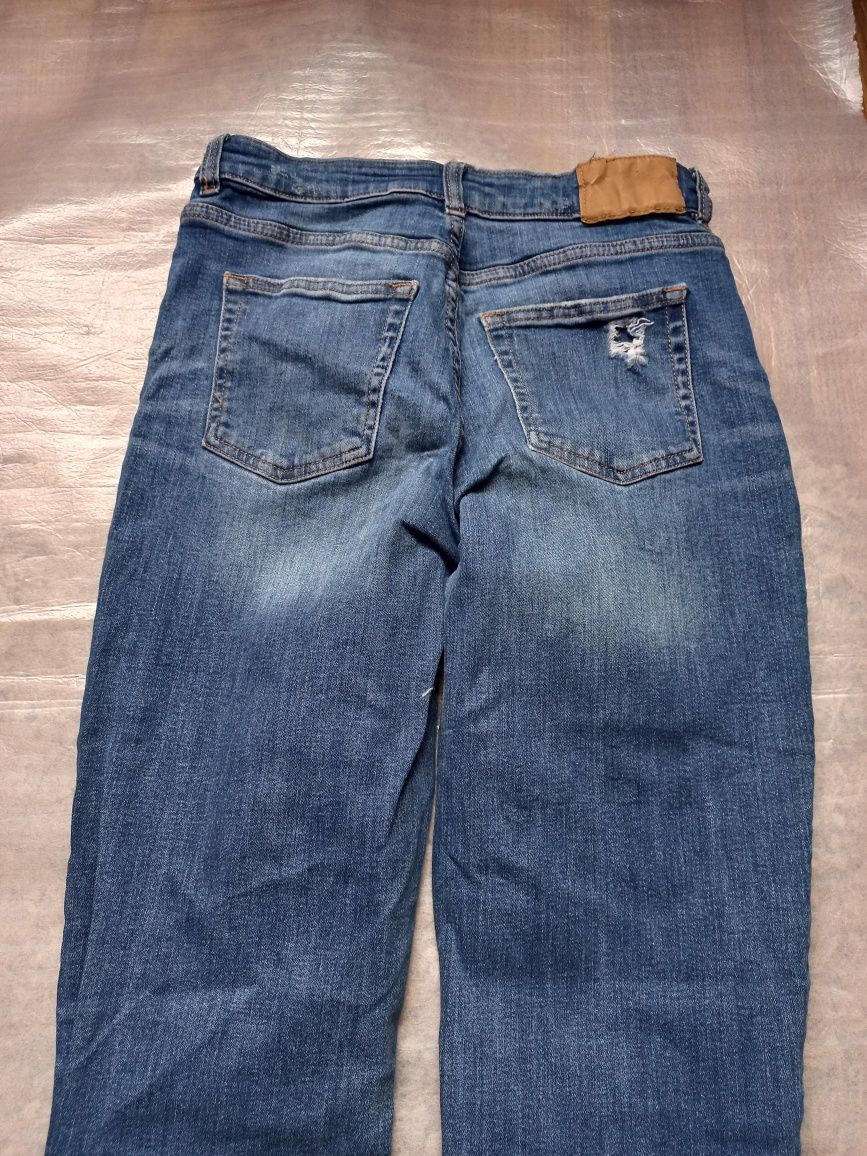 Spodnie jeansy z dziurami H&M