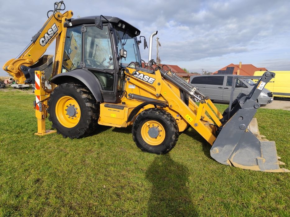 Koparko ładowarka case JCB cat