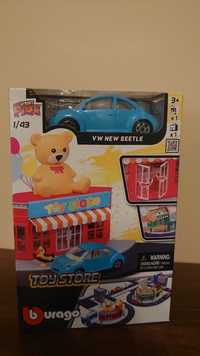 Zestaw Bburago Street Fire ToyStore z VW New Beetle w skali 1:43.