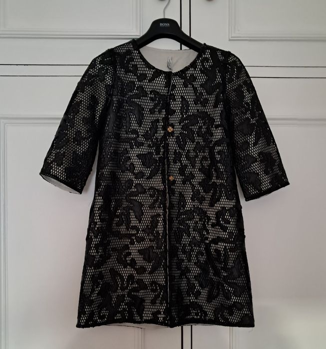 Casaco preto arrendado