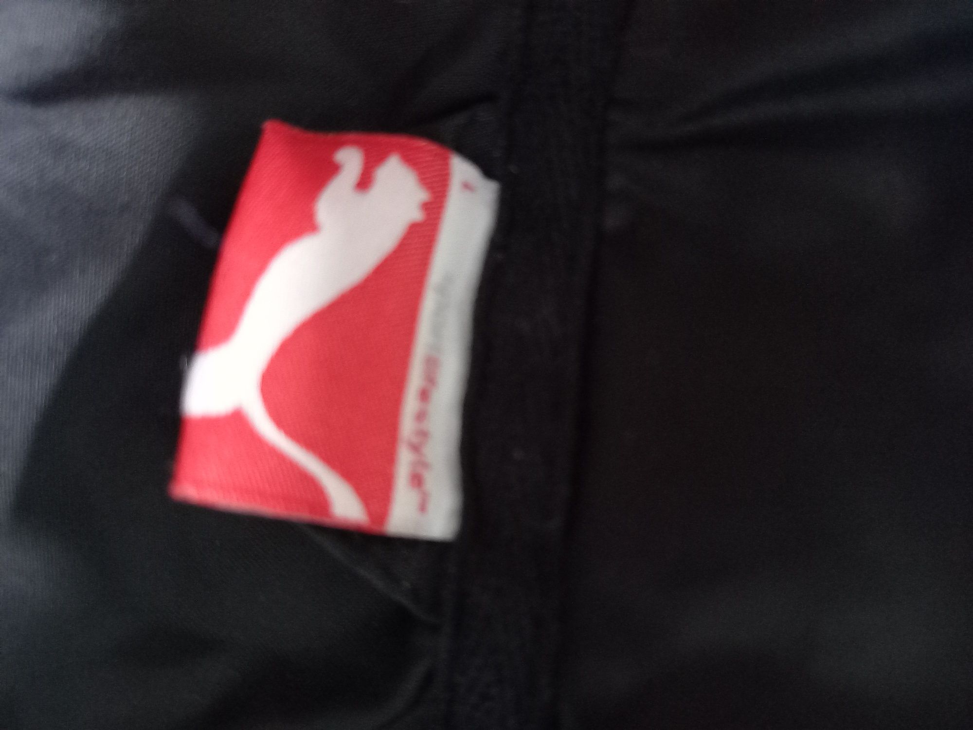Oryginalna czarna kurtka przejściowa marki Puma L.