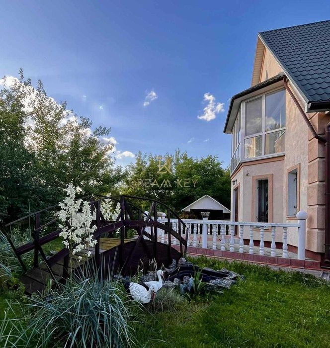 Продам теплий будинок 210кв, 3 спальні, камін, вихід до річки Осокорки