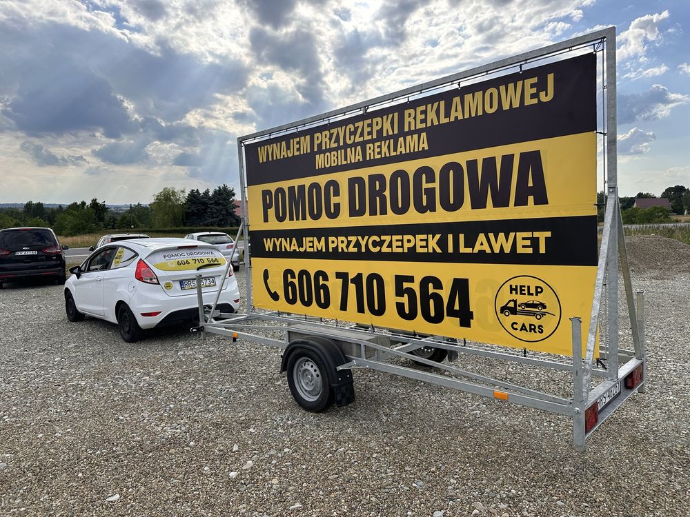 Przyczepka reklamowa wynajem reklama stacjonarna mobilna