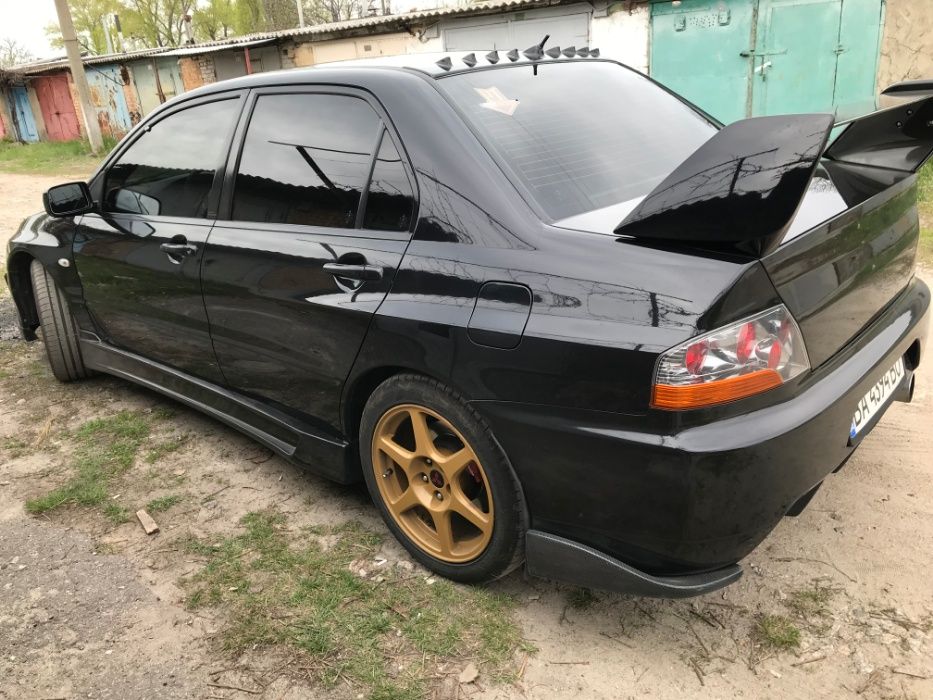 Накладки на задний бампер Lancer Evo