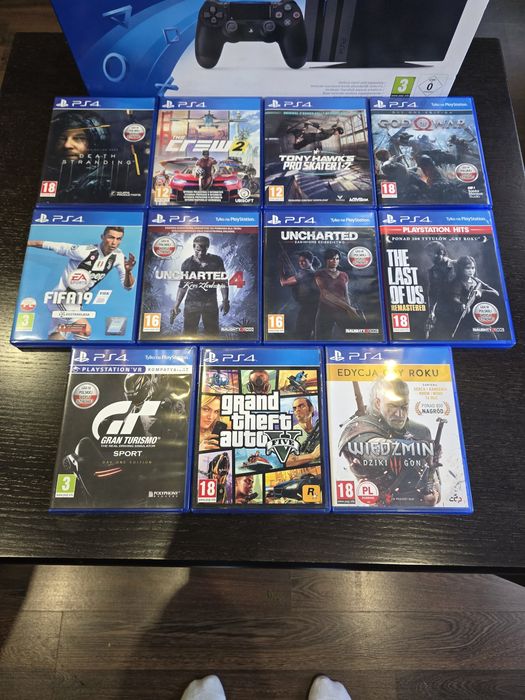 PS4 Pro 1TB + 2 pady + GTA V, Wiedźmin 3, God of War, TLOU + 11 gier