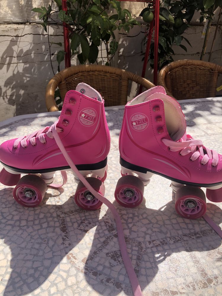 Patins de Criança 04 rodas , tamanho 31 Marca Free , usado .